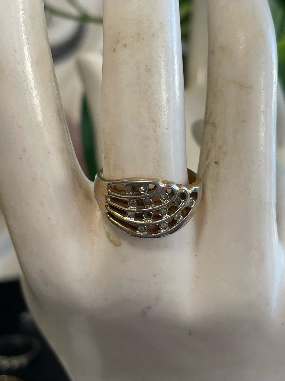Elegant Gold Tone Wave Ring with Accent Stones
